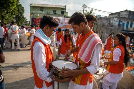 AMRAVATI, MAHARASHTRA, INDIA - 27 SEPTEMBER 2018: Unidentified faithful people carrying Hindu God Ganesha for immersion near water bodies during Ganesha festival. Annual festival.のeditorial素材