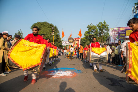 AMRAVATI, MAHARASHTRA, INDIA - 27 SEPTEMBER 2018: Unidentified faithful people carrying Hindu God Ganesha for immersion near water bodies during Ganesha festival. Annual festival.のeditorial素材