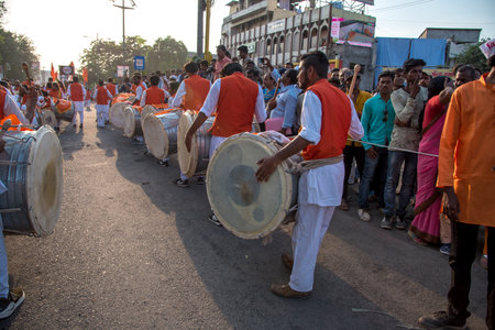 AMRAVATI, MAHARASHTRA, INDIA - 27 SEPTEMBER 2018: Unidentified faithful people carrying Hindu God Ganesha for immersion near water bodies during Ganesha festival. Annual festival.のeditorial素材