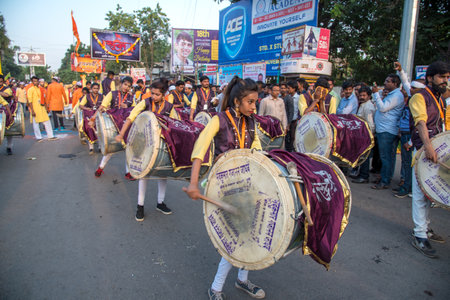 AMRAVATI, MAHARASHTRA, INDIA - 27 SEPTEMBER 2018: Unidentified faithful people carrying Hindu God Ganesha for immersion near water bodies during Ganesha festival. Annual festival.のeditorial素材