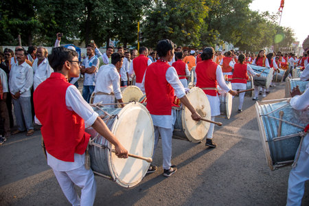 AMRAVATI, MAHARASHTRA, INDIA - 27 SEPTEMBER 2018: Unidentified faithful people carrying Hindu God...