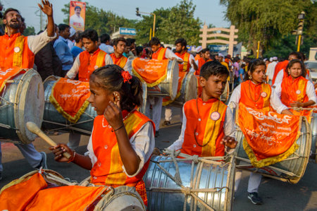 AMRAVATI, MAHARASHTRA, INDIA - 27 SEPTEMBER 2018: Unidentified faithful people carrying Hindu God Ganesha for immersion near water bodies during Ganesha festival. Annual festival.のeditorial素材