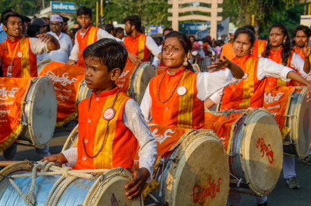 AMRAVATI, MAHARASHTRA, INDIA - 27 SEPTEMBER 2018: Unidentified faithful people carrying Hindu God Ganesha for immersion near water bodies during Ganesha festival. Annual festival.のeditorial素材