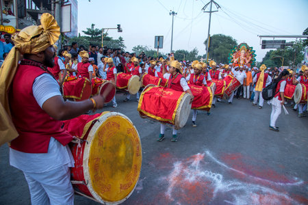 AMRAVATI, MAHARASHTRA, INDIA - 27 SEPTEMBER 2018: Unidentified faithful people carrying Hindu God Ganesha for immersion near water bodies during Ganesha festival. Annual festival.のeditorial素材