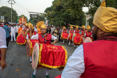 AMRAVATI, MAHARASHTRA, INDIA - 27 SEPTEMBER 2018: Unidentified faithful people carrying Hindu God Ganesha for immersion near water bodies during Ganesha festival. Annual festival.のeditorial素材