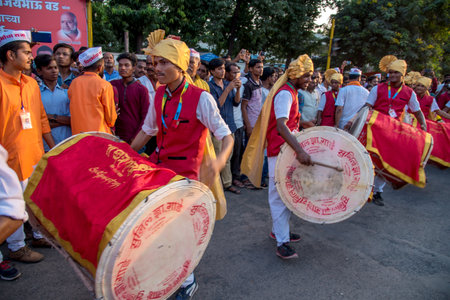 AMRAVATI, MAHARASHTRA, INDIA - 27 SEPTEMBER 2018: Unidentified faithful people carrying Hindu God Ganesha for immersion near water bodies during Ganesha festival. Annual festival.のeditorial素材