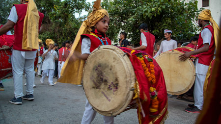 AMRAVATI, MAHARASHTRA, INDIA - 27 SEPTEMBER 2018: Unidentified faithful people carrying Hindu God...