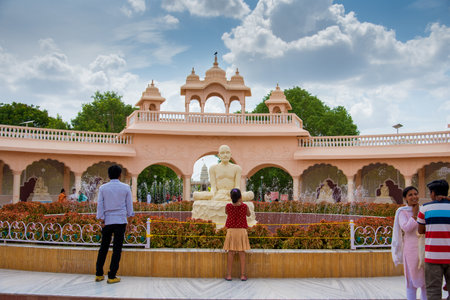 SHEGAON, MAHARASHTRA, INDIA, 10 JULY 2017 : Unidentified tourist enjoying an architectural wonder at Anand Sagar Shri Saint Gajanan Maharaj Sansthan. Anand Sagar is tourist attraction place of Shegaonのeditorial素材