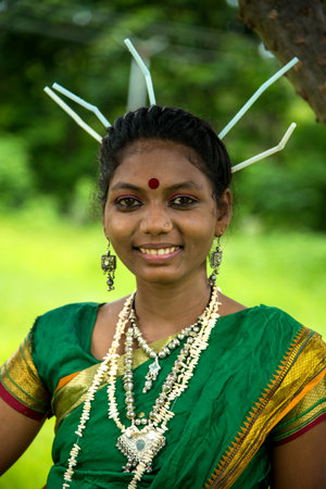AMRAVATI, MAHARASHTRA, INDIA - AUGUST 9 : Group of Gondi tribes celebrating world tribal day by performing folk Dance in Amravati, Maharashtra, Indiaのeditorial素材