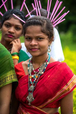 AMRAVATI, MAHARASHTRA, INDIA - AUGUST 9 : Group of Gondi tribes celebrating world tribal day by performing folk Dance in Amravati, Maharashtra, Indiaのeditorial素材