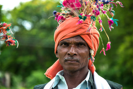 AMRAVATI, MAHARASHTRA, INDIA - AUGUST 9: Unidentified group of Korku tribe celebrating world tribal day by performing a dance on traditional music, Korku tribe found in Madhya Pradesh and Maharashtra, Indiaのeditorial素材
