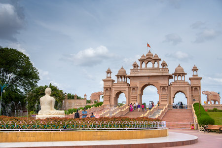 SHEGAON, MAHARASHTRA, INDIA, 10 JULY 2017 : Unidentified tourist enjoying an architectural wonder at Anand Sagar Shri Saint Gajanan Maharaj Sansthan. Anand Sagar is tourist attraction place of Shegaonのeditorial素材