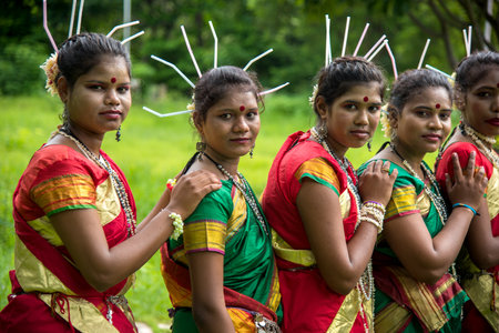 AMRAVATI, MAHARASHTRA, INDIA - AUGUST 9 : Group of Gondi tribes celebrating world tribal day by performing folk Dance in Amravati, Maharashtra, Indiaのeditorial素材