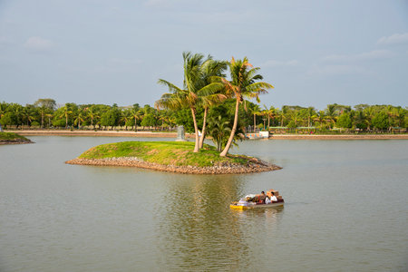 SHEGAON, MAHARASHTRA, INDIA, 10 JULY 2017 : Unidentified tourist enjoying an architectural wonder at Anand Sagar Shri Saint Gajanan Maharaj Sansthan. Anand Sagar is tourist attraction place of Shegaonのeditorial素材