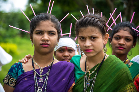 AMRAVATI, MAHARASHTRA, INDIA - AUGUST 9 : Group of Gondi tribes celebrating world tribal day by performing folk Dance in Amravati, Maharashtra, Indiaのeditorial素材