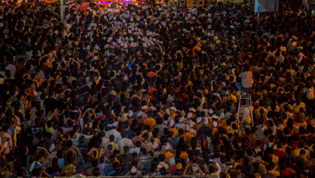 AMRAVATI, MAHARASHTRA, INDIA - 27 SEPTEMBER 2018: Crowd of unidentified people carrying Hindu God Ganesha for immersion to water bodies during Ganesha festival. Annual festival.のeditorial素材