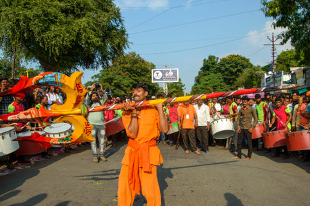 AMRAVATI, MAHARASHTRA, INDIA - 27 SEPTEMBER 2018: A man performing with heavy Trishul (Trident) in...