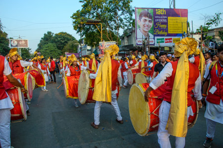 AMRAVATI, MAHARASHTRA, INDIA - 27 SEPTEMBER 2018: Crowd of unidentified people carrying Hindu God...