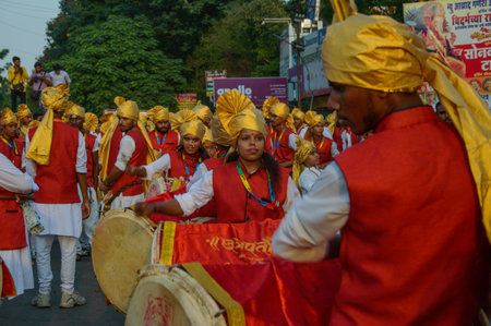 AMRAVATI, MAHARASHTRA, INDIA - 27 SEPTEMBER 2018: Crowd of unidentified people carrying Hindu God...
