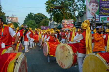 AMRAVATI, MAHARASHTRA, INDIA - 27 SEPTEMBER 2018: Crowd of unidentified people carrying Hindu God...