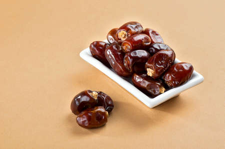 Dates in plate. Dried dates fruits.の写真素材