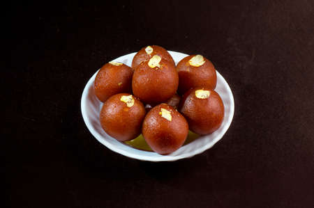 Gulab Jamun, Indian dessert topped with pistachioの写真素材