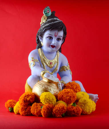 Hindu God Krishna on red backgroundの写真素材