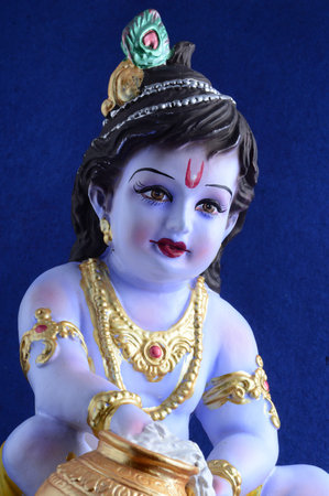 Hindu God Krishna on blue background