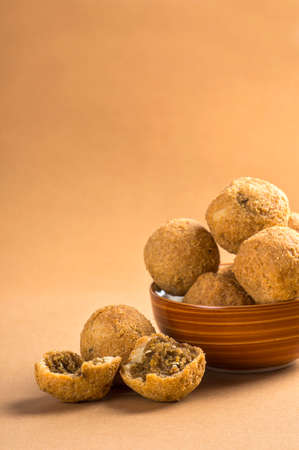 Kachori or Kachauri or Kachodi or Katchuri is a spicy snack, snacks with tea and green salad and tomato ketchupの写真素材