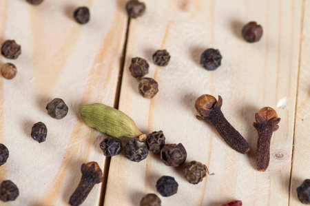 Spices and herbs. Food and cuisine ingredients. Cinnamon sticks, anise stars, black peppercorns,...