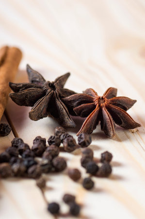 Spices and herbs. Food and cuisine ingredients. Cinnamon sticks, anise stars and black peppercorns...
