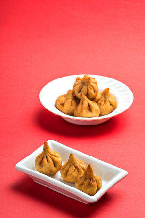 Indian Food: Modak, Maharashtra Sweet Dish, favourite sweet of lord ganesha, greeting card design....