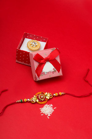 Raakhi and a gift for the sister given by brother on the occasion of Raksha Bandhan. Indian festival...