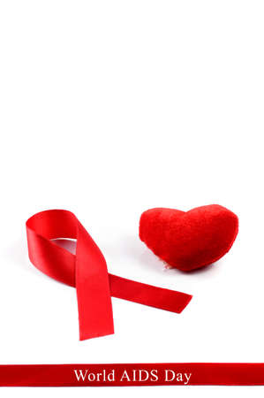 Aids ribbon and heart on white background.の写真素材
