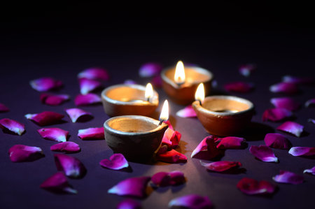 Clay diya lamps lit during diwali celebration. Greetings Card Design Indian Hindu Light Festival...