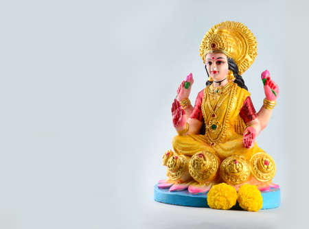 Lakshmi - Hindu goddess ,Goddess Lakshmi. Goddess Lakshmi during Diwali Celebration. Greetings Card Design Indian Hindu Light Festival called Diwaliの写真素材