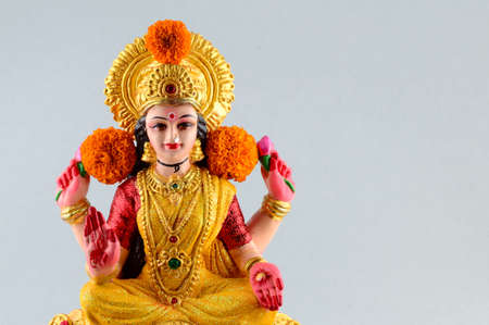 Lakshmi - Hindu goddess ,Goddess Lakshmi. Goddess Lakshmi during Diwali Celebration. Greetings Card Design Indian Hindu Light Festival called Diwaliの写真素材