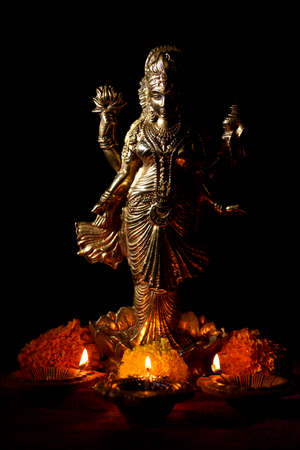 Lakshmi - Hindu goddess ,Goddess Lakshmi. Goddess Lakshmi during Diwali Celebration. Indian Hindu Light Festival called Diwaliの写真素材