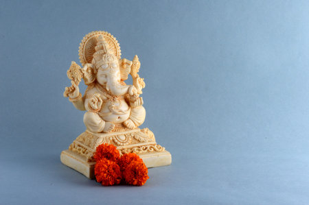 Hindu God Ganesha. Ganesha Idol on gray backgroundの写真素材