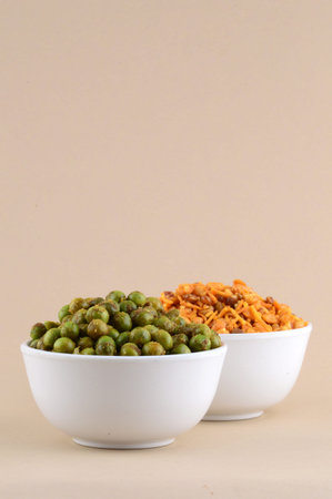 Indian Snacks : Mixture and Spiced fried green peasの写真素材