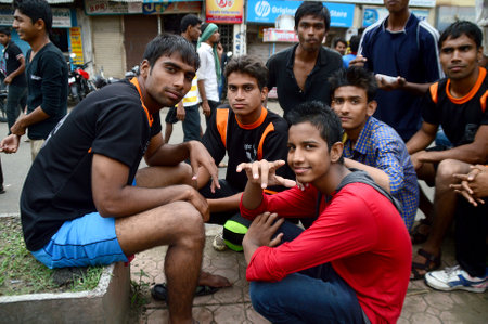 AMRAVATI, MAHARASHTRA, INDIA - AUGUST 24 : Crowd of young People enjoying "Govinda" at Dahi Handi festival to celebrate God Krishna's Birth in Amravati, Maharashtra, India. 24 August 2014のeditorial素材