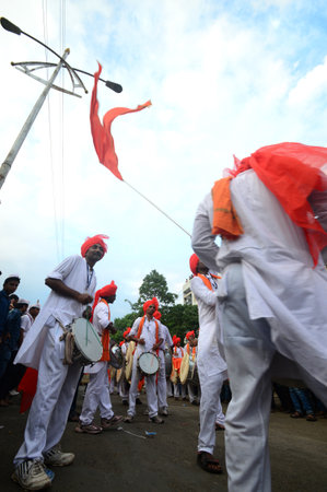 AMRAVATI, MS, INDIA - SEPTEMBER 11: Ganesha idols are being transported for immersion with drums in water bodies on September 11, 2014 in Amravati, Maharashtra, India. This is an annual festival.のeditorial素材