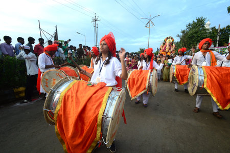 AMRAVATI, MS, INDIA - SEPTEMBER 11: Ganesha idols are being transported for immersion with drums in...