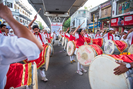 AMRAVATI, MAHARASHTRA, INDIA - SEPTEMBER 05: Lord Ganesha procession for Ganesh Chaturthi, people celebrating Ganesh Chaturthi with music and drums on September 05, 2016 in Maharashtra, India.のeditorial素材