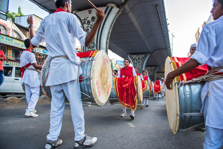AMRAVATI, MAHARASHTRA, INDIA - SEPTEMBER 05: Lord Ganesha procession for Ganesh Chaturthi, people celebrating Ganesh Chaturthi with music and drums on September 05, 2016 in Maharashtra, India.のeditorial素材