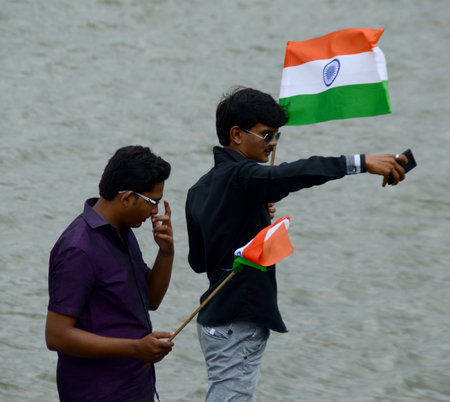 NAGPUR, MAHARASHTRA, INDIA, AUGUST - 15 : Unidentified people celebrating Independence Day by...