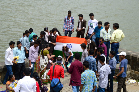 NAGPUR, MAHARASHTRA, INDIA, AUGUST - 15 : Unidentified people celebrating Independence Day by...