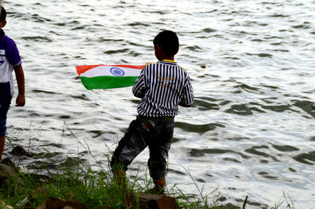 NAGPUR, MAHARASHTRA, INDIA, AUGUST - 15 : Unidentified people celebrating Independence Day at Futala lake in Nagpur on 15 August 2014のeditorial素材