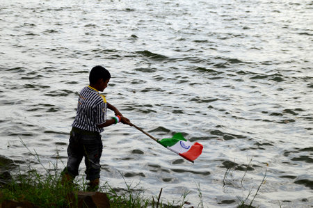 NAGPUR, MAHARASHTRA, INDIA, AUGUST - 15 : Unidentified people celebrating Independence Day at Futala lake in Nagpur on 15 August 2014のeditorial素材