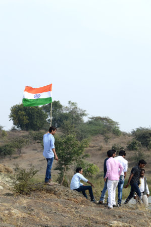 NAGPUR, MAHARASHTRA, INDIA, JANUARY - 26 : Unidentified people celebrating republic Day by dancing and waving Indian flag in Nagpur on 26 January 2014のeditorial素材